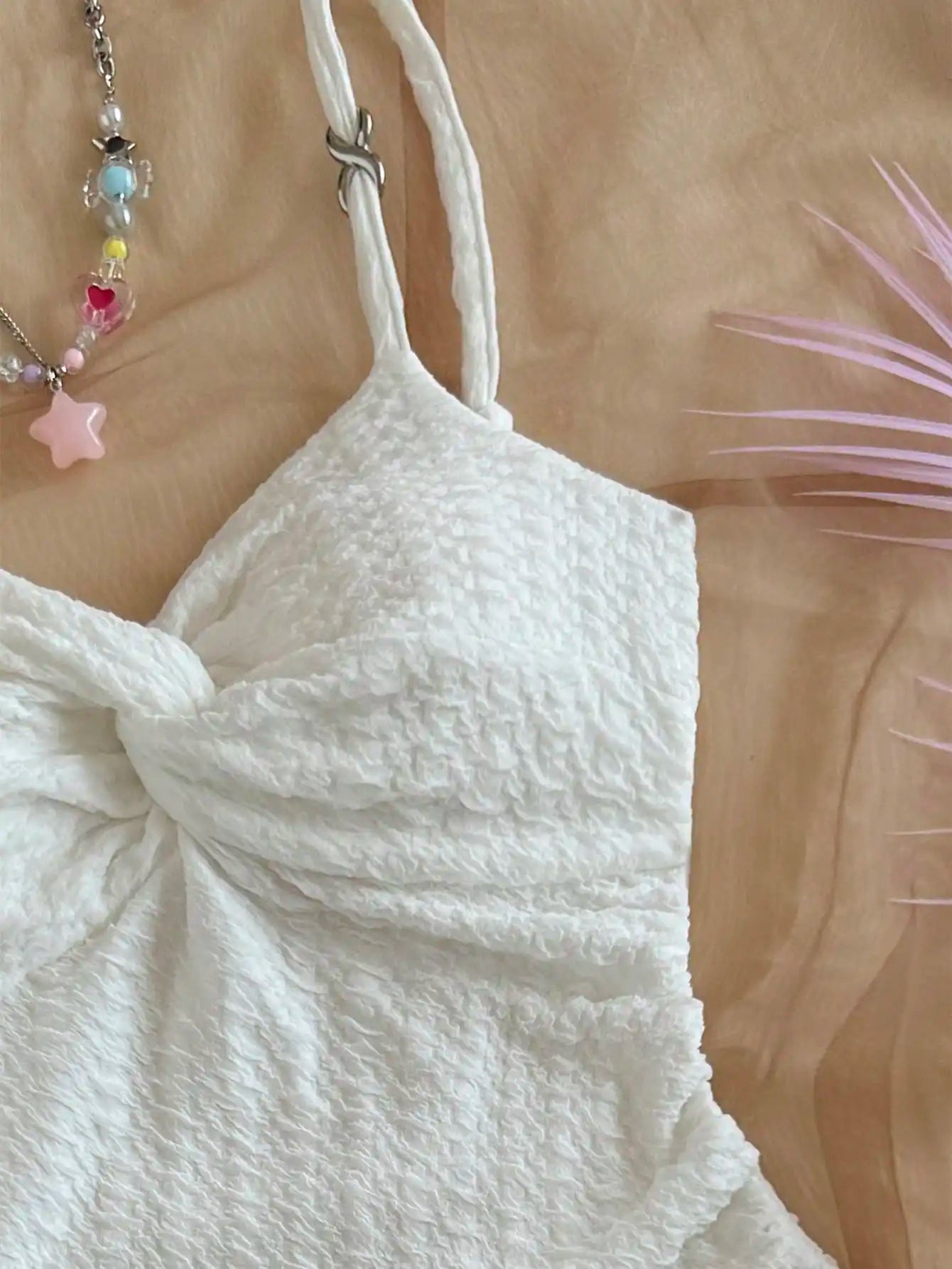 White Textured Knit Dress with Twist Bust and Ruffle Hem, Fitted Silhouette for Summer Vacations and Casual Outings
